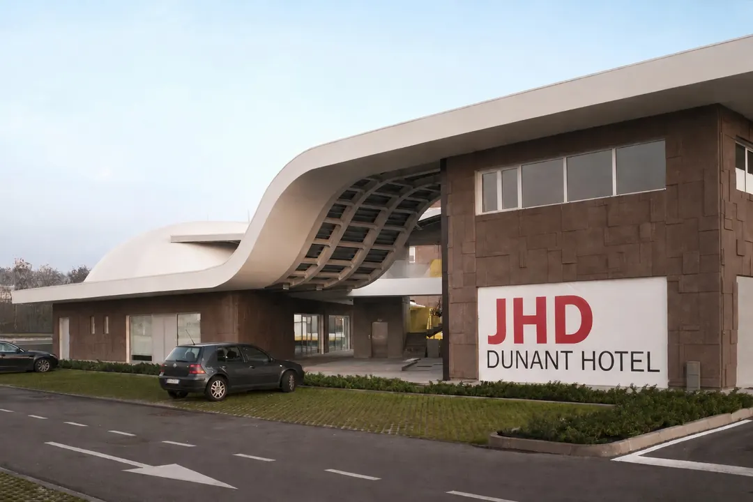 Ingresso dell'Hotel Dunant con la pensilina bianca sinuosa